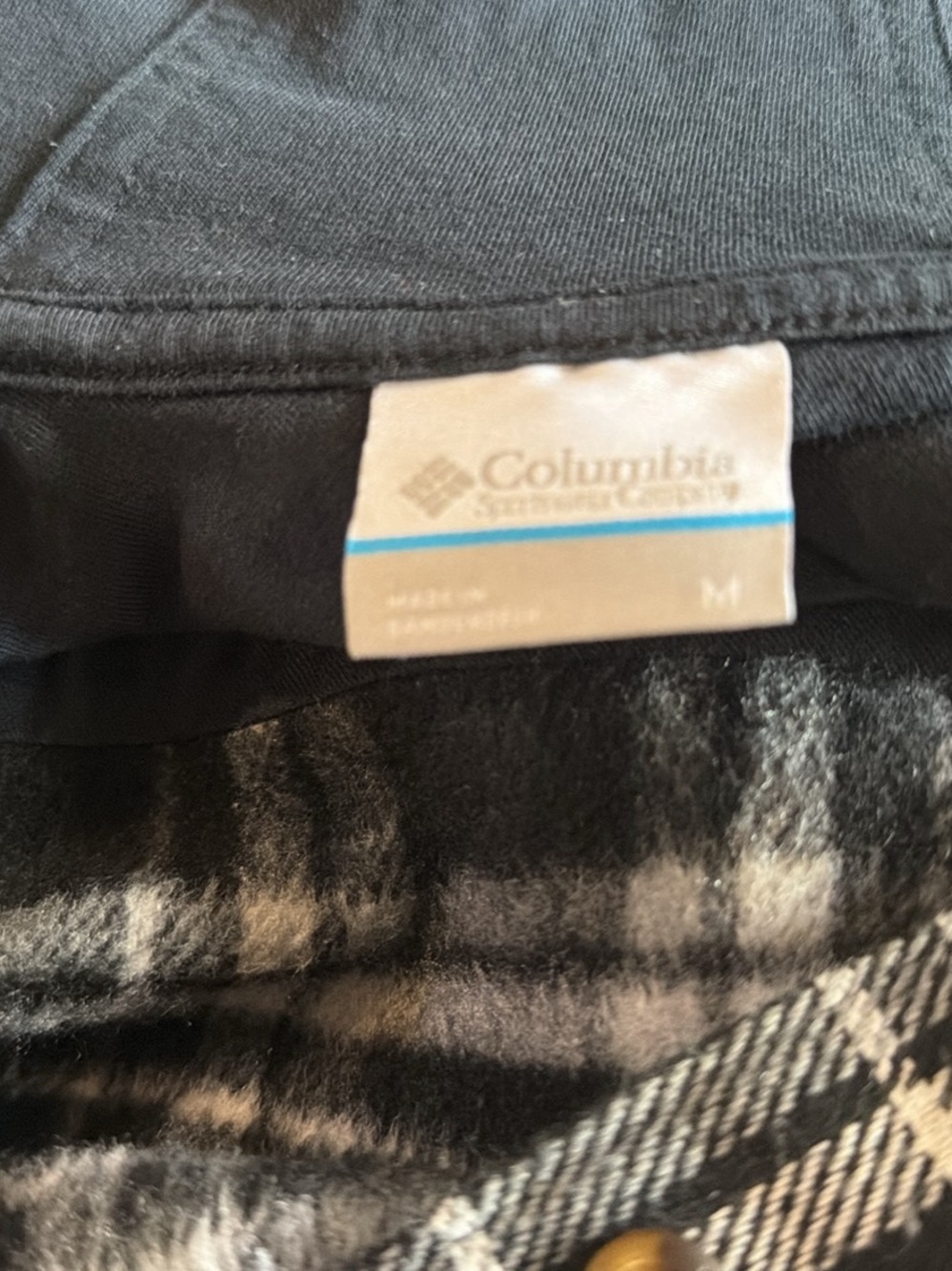 Columbia Black Jacket with Black-and-White Plaid Lining